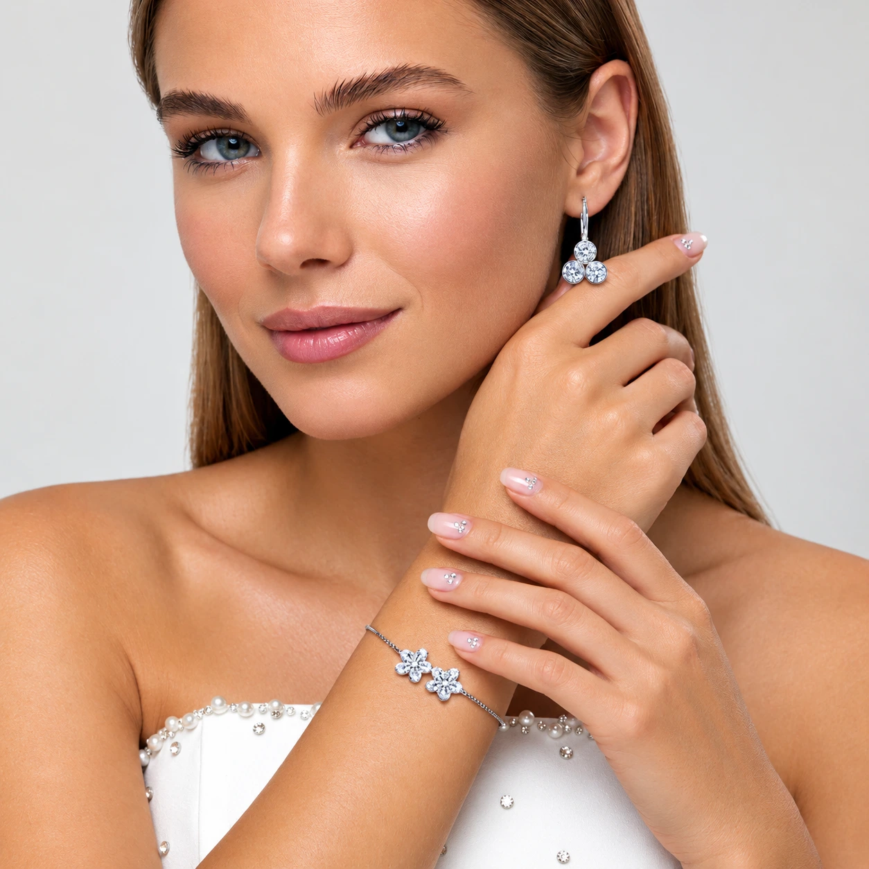 BonVulux model wearing crystal jewelry and crystal nail art